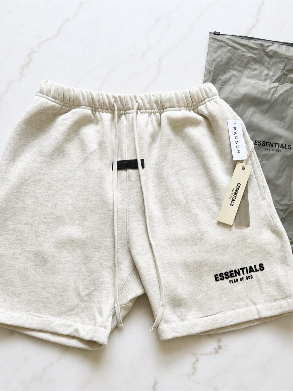 Fear of god essentials shorts light oatmeal